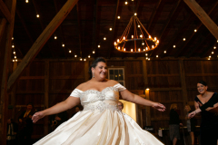 Bride dancing in Bank Barn